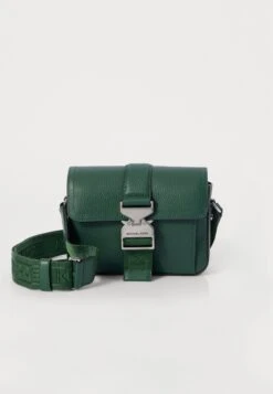 Michael Kors AVIATOR XBODY - Cross Body Bag - Mulberry -Michael Kors Geschaft 3b4feb24df774ac7a41d14c03af8e301