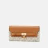 MICHAEL Michael Kors HAMILTON LEGACY CARRYALL WALLET - Geldbörse - Vanilla -Michael Kors Geschaft 530430c8eb884bb287761189dc76be97