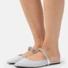 MICHAEL Michael Kors JESSA FLEX FLAT MULE - Pantolette Flach - Silver-coloured -Michael Kors Geschaft b4601832090642bcb3c63f782f86618e