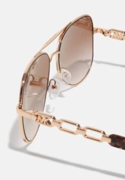 Michael Kors CHIANTI - Sonnenbrille - Rose Gold-coloured -Michael Kors Geschaft e302d492a5dc407bb42a013a5ea0e76b